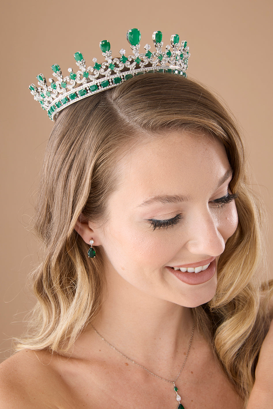Emerald crystal tiara with green gemstones and clear crystal spikes, silver-tone crown