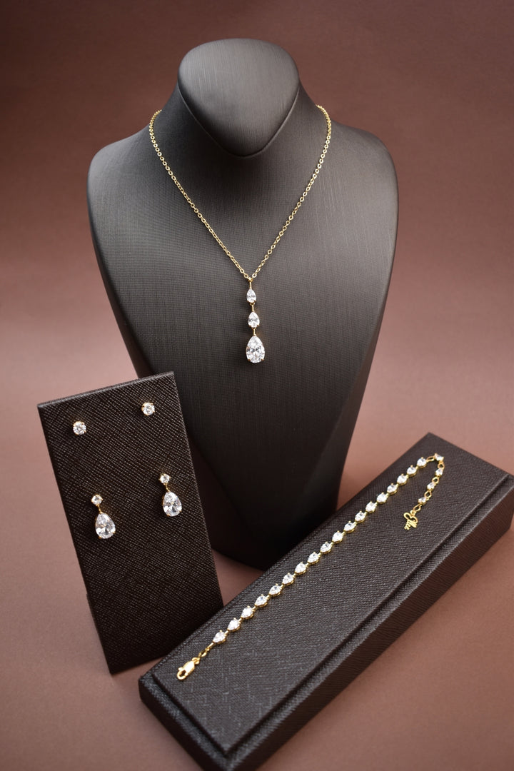 Dala Jewelry Set with white crystal on bust Gold tone