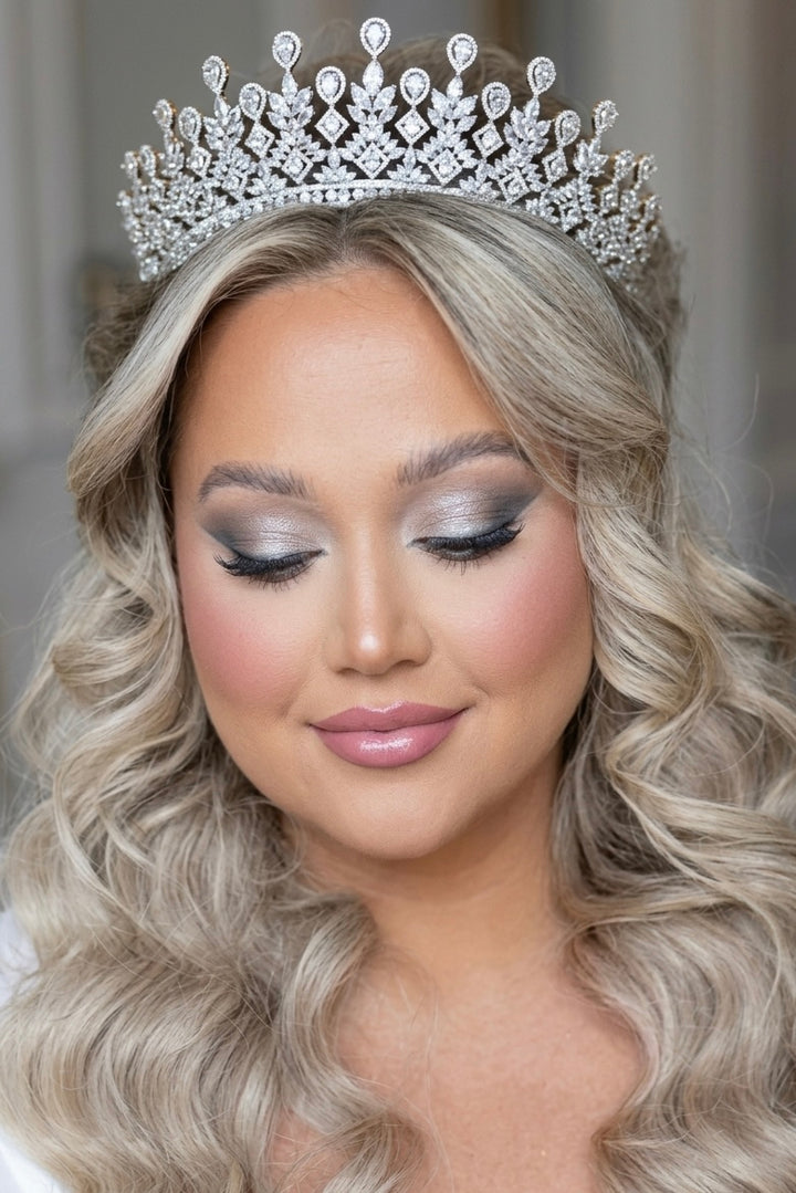Silver-tone simulated diamond tiara with ornate leaf and diamond accents