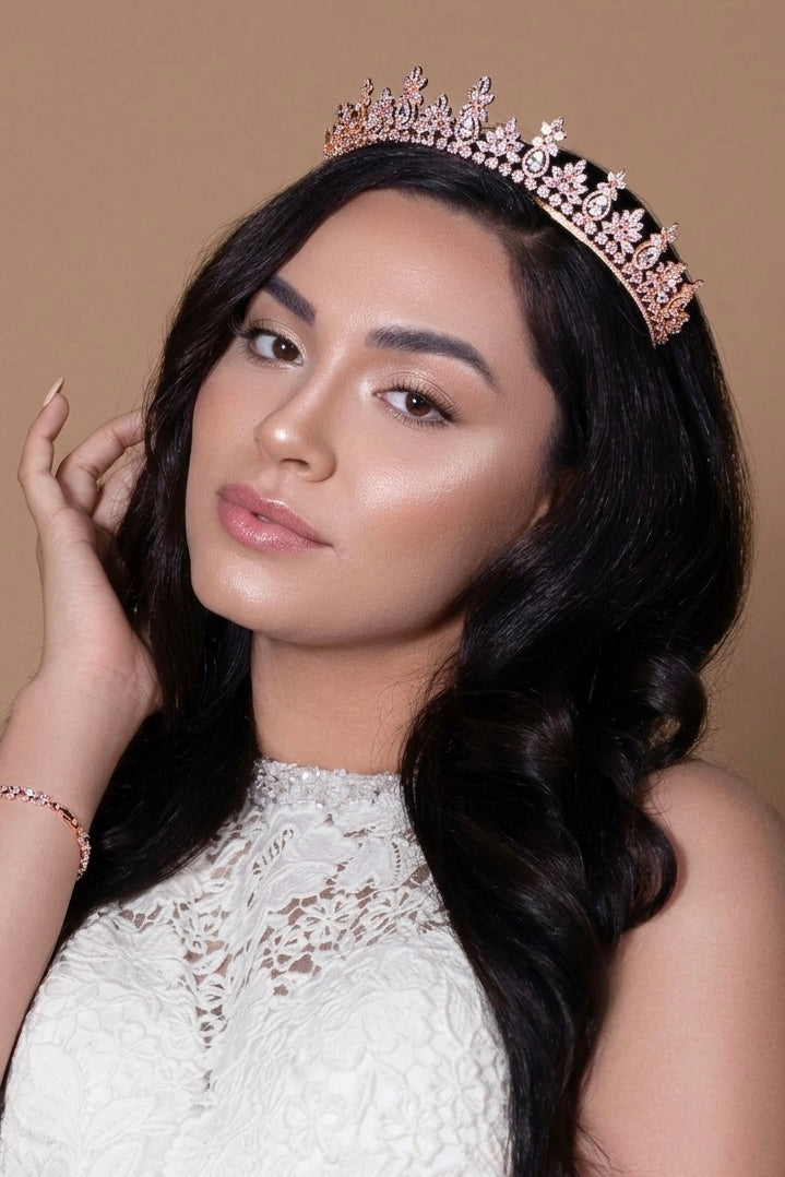 Simulated diamond tiara with rose-gold floral crown and pink accents