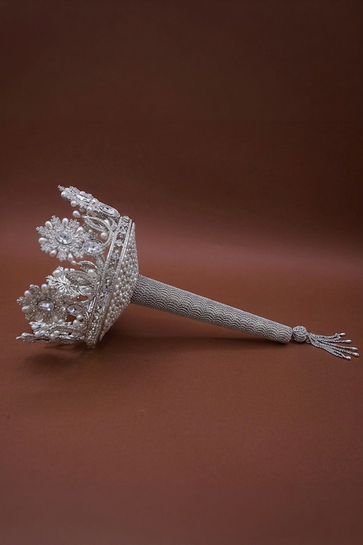 Silver-tone crystal crown bouquet holder with long mesh beaded handle, side view