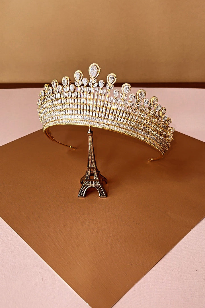 Gold-tone crystal tiara crown with arched band and oval rhinestone accents