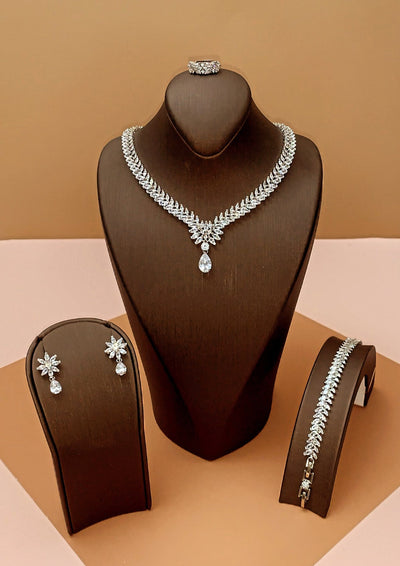 ESSENCE Jewelry Set with Necklace, Bracelet, Drop Earrings, and Ring